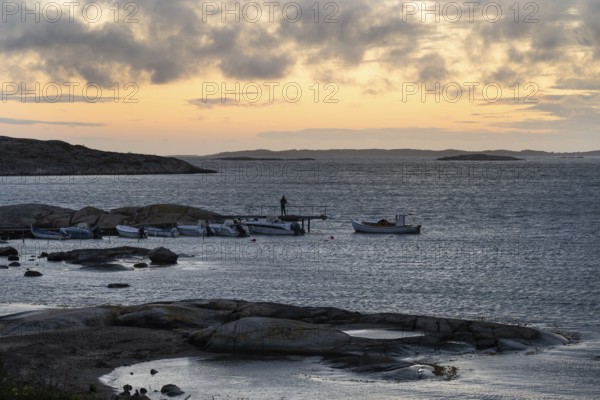 Small bay, archipelago, jetty with angler, Resö Island, Bohuslän, Skagerrak, Sotenäs, Västra