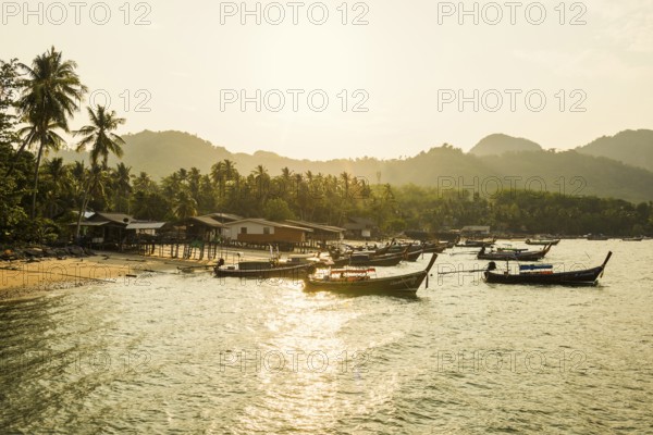 Fishing huts on the beach, sunset, Koh Mook, Trang province, southern Thailand, Andaman Sea,