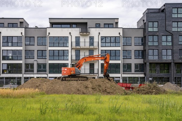 Shell construction, shortly in front of completion of a residential building, new Graf Bismarck