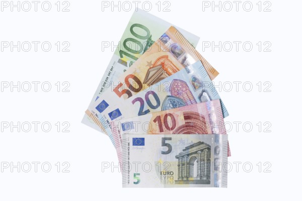 Various euro banknotes on white background, 5 euro, 10 euro, 20 euro, 50 euro, 100 euro