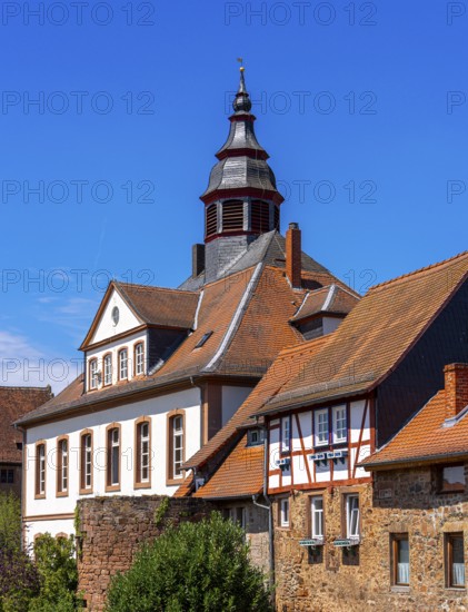The old town centre with half-timbered houses, church towers and remains of the town wall in