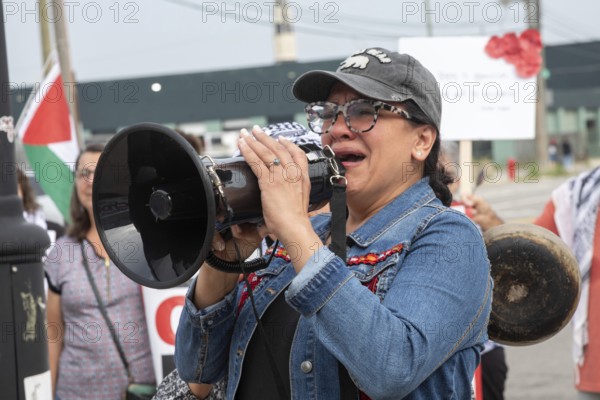 Detroit, Michigan USA - 26 July 2025 - Protesters rally at Eastern Market, banging empty pots to