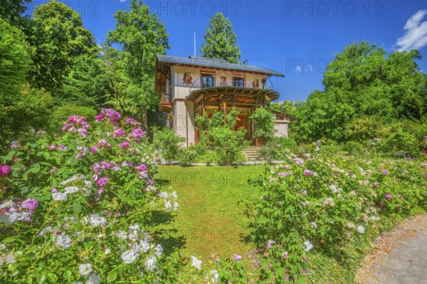 Rose garden in front of the Pompeian-Bavarian casino on the Rose Island in Lake Starnberg,