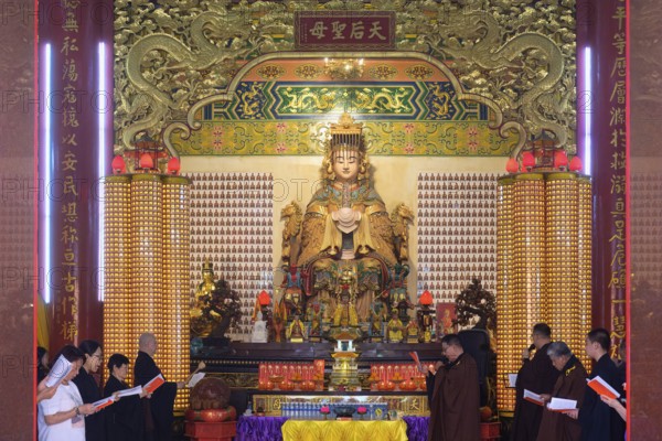 Thean Hou Temple to the Goddess Mazu, Prayers in the Intercession shrine, Kuala Lumpur, Malaysia,