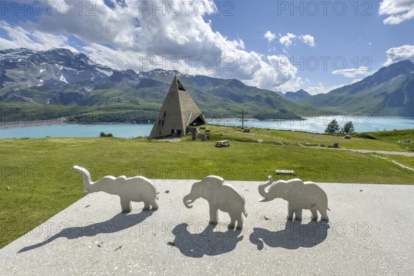 View from viewing platform to Mont-Cenis Pyramid Museum with stylised pyramid Museum in memory of
