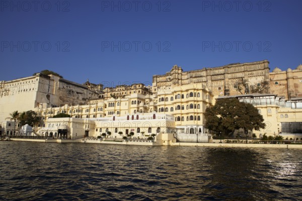 City Palace at Lake Pichola in the evening light, Udaipur, Rajasthan, India