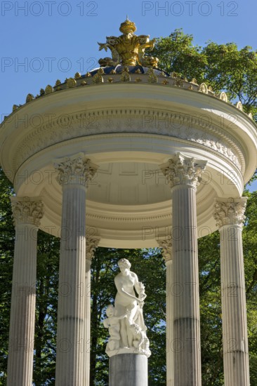 Statue of Venus with Cupid in the Temple of Venus above the terraced gardens, park of Linderhof