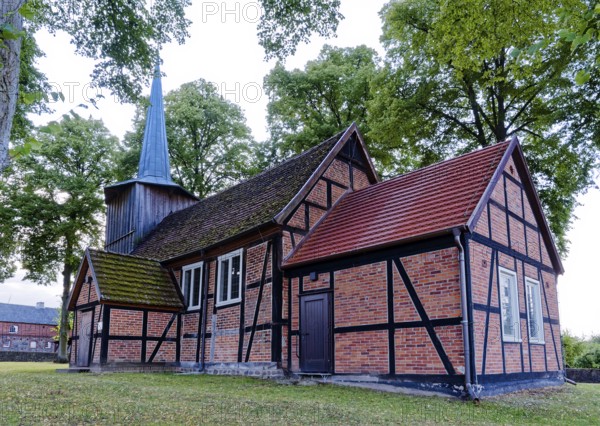 Prorep village church, a half-timbered church with a wooden tower, in the village centre. Porep is