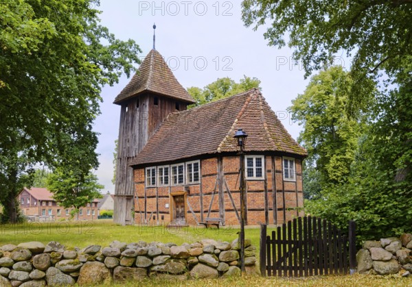 The village church of Karrenzin is a half-timbered church dating from 1721. The boarded tower on