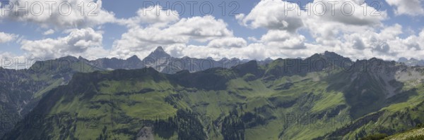 Mountain panorama from the Koblat high trail on the Nebelhorn over the Obertal valley with lush