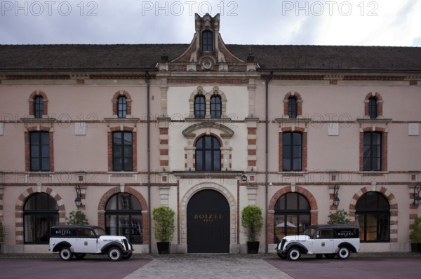 Black and white Renault Juvaquatre Editorial vintage cars in front of headquarters, head office,