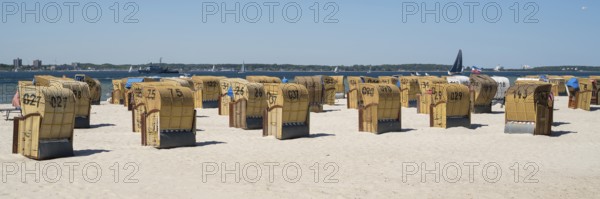 Beach chairs on the sandy beach, Laboe, Baltic seaside resort, fjord, Baltic Sea, North Frisia,