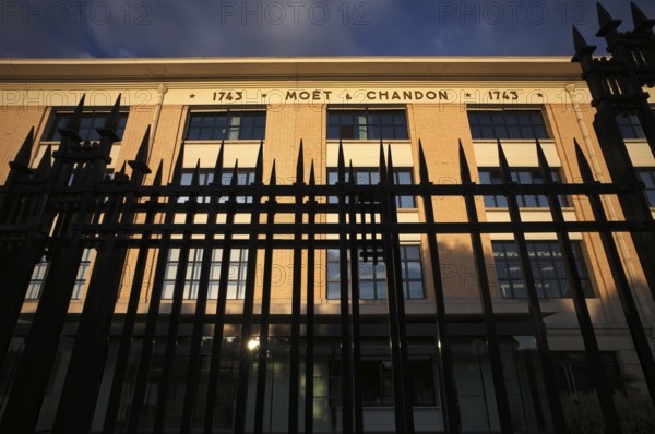Fence in front of company headquarters, headquarters of the champagne brand Moët & Chandon, part of
