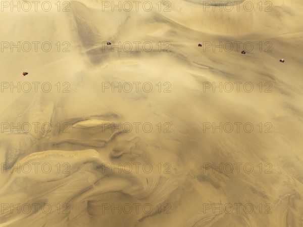 Quad bikes in the dunes of the Namib Desert in the vicinity of the coastal town of Swakopmund.