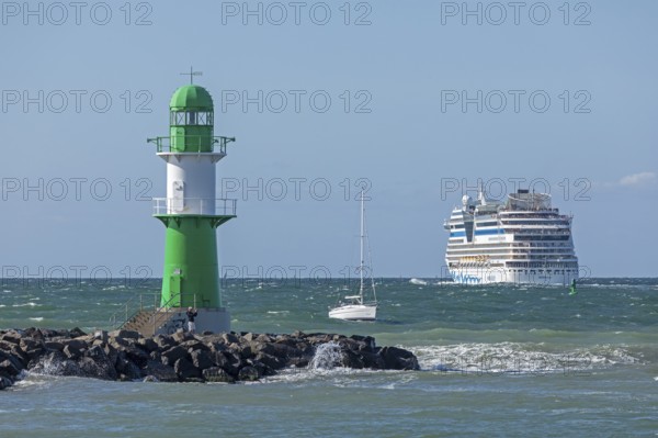Cruise ship AIDA nova leaving, lighthouse, Warnow estuary, Baltic Sea, Warnemünde, Rostock,