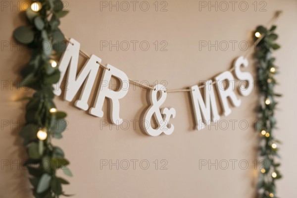 Close up of Mr & Mrs wedding garland. Romantic wedding decoration detail. Generative ai, AI