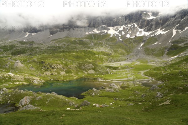 The Lacs des Aires lake in the Cirque de Troumouse basin in the Pyrenees National Park near