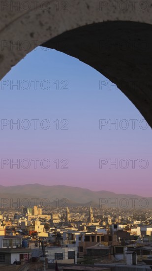 Arequipa, Peru. Sunset view of the Misti Volcano mountain range from the Yanahuara lookout