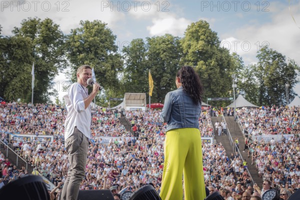 Sebastian Oswald and Simone Panteleit, presenters at the Berliner Rundfunk 91.4 Open Air at the