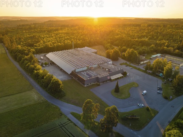 Factory at sunset, surrounded by woods and streets, Schnaufer sparkling wine cellars, Althengstett