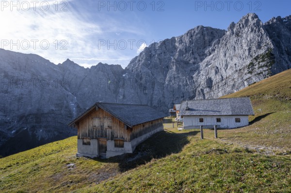 Alpine huts of the Lalidersalm Hochleger, rocky mountain ridge with Grubenkarspitze in the