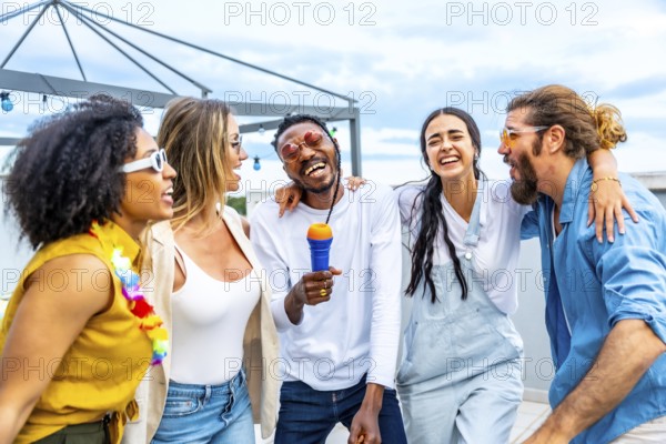 Five cheerful friends singing karaoke and enjoying a lively rooftop party, creating unforgettable