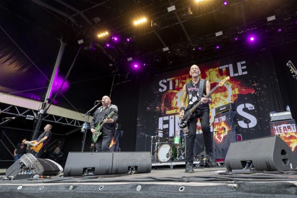 Jake Burns, singer, guitarist, Stiff Little Fingers, punk rock band, Northern Ireland, open air at