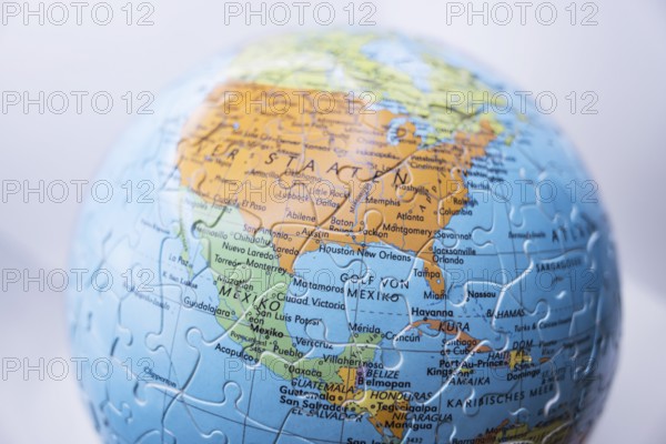 Puzzle globe. Map made from puzzle pieces. Gulf of Mexico