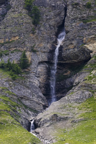 Waterfall cascading down a rock face, Zinal Valley, Val d'Anniviers, Valais Alps, Canton Valais,