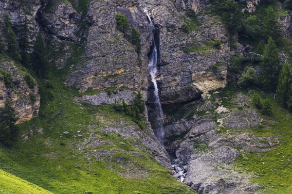 Waterfall cascading down a rock face, Zinal Valley, Val d'Anniviers, Valais Alps, Canton Valais,