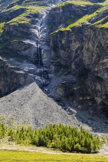 Waterfall cascading down a rock face, Zinal Valley, Val d'Anniviers, Valais Alps, Canton Valais,