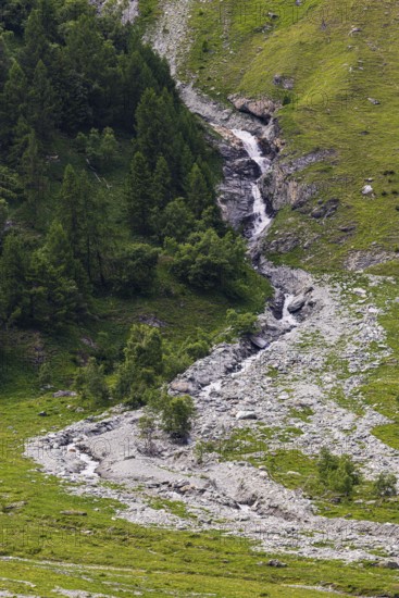 Waterfall cascading down the valley, Zinal Valley, Val d'Anniviers, Valais Alps, Canton Valais,