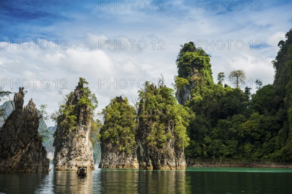 Lake with jungle and rainforest and steep mountains, Cheow Lan Lake, Khao Sok National Park, Phang