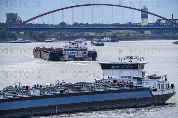 Cargo ships on the Rhine, in the background the Rhine bridge near Duisburg-Rheinhausen, Bridge of