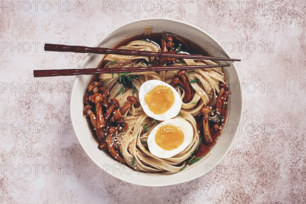 Buckwheat noodles soba with shimeji mushrooms, with boiled egg, green onion, sesame seeds,