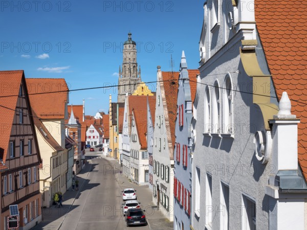 View from the medieval town wall over the houses of the historic old town to the tower of St