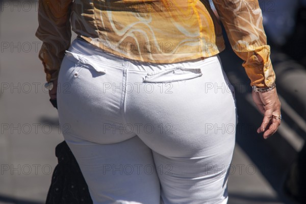 Woman walking in the street, From behind, Obesity, Close-up, City of Quito. Pichincha province,