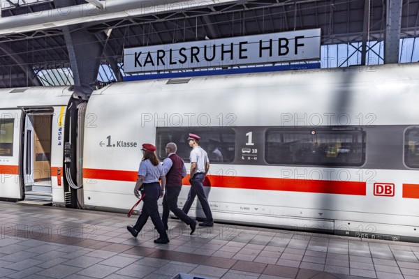 Karlsruhe main station with ICE and employees of Deutsche Bahn AG. Karlsruhe, Baden-Württemberg,