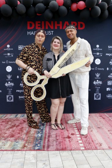Julian F. M. Stöckel, Janine Becker and Marcell Damaschke at the VIP opening of the new Deinhard