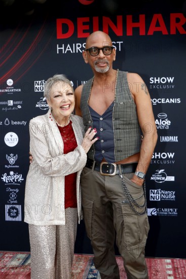 Barbara Schöne and Pierre Sanoussi-Bliss at the VIP opening of the new Deinhard Salon Am Mühlanger