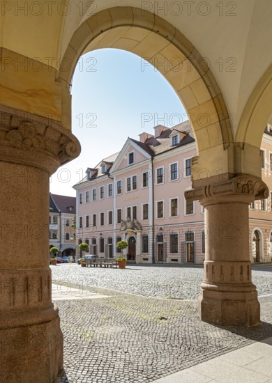 View of Hotel Börse through the arches of the New Town Hall of Görlitz, Lower Market Square -