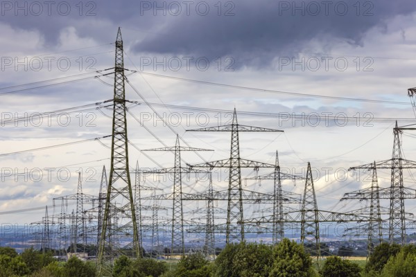 Many high-voltage power lines and lattice towers in the district of Ludwigsburg near Besigheim,