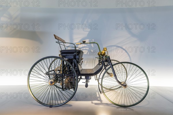 Daimler Motor-Quadricycle steel-wheeled carriage from 1889. The Mercedes-Benz Museum in Stuttgart