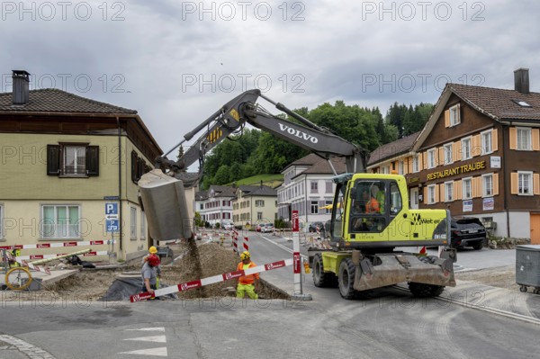 Road construction site mobile excavator, Gähwil, St. Gallen, Switzerland