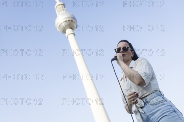 Singer Veronika Bognar on Alexanderplatz as part of the Fête de la Musique. The music event, which