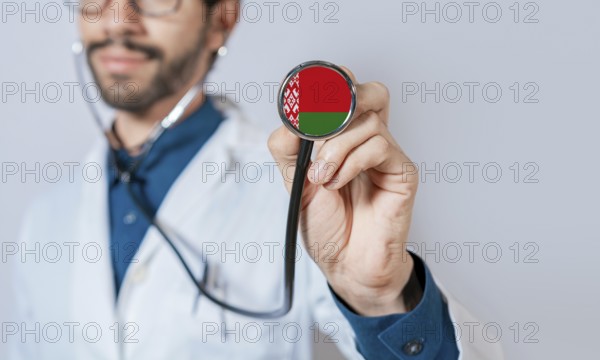 Doctor holding stethoscope with Belarus flag. Belarus health and care concept, Belarus flag on