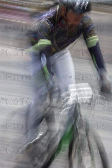Man riding a bicycle, Photo with motion blur, City of Quito, Pichincha province, Ecuador, South