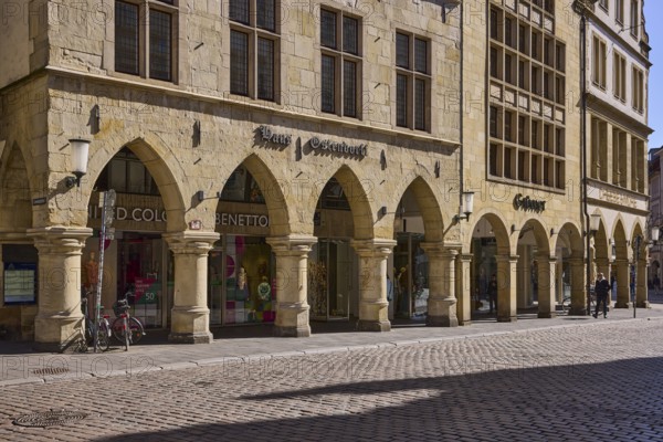 Old town, historic buildings, arcades, facade, window, lamp, wall anchor, cobblestone street,