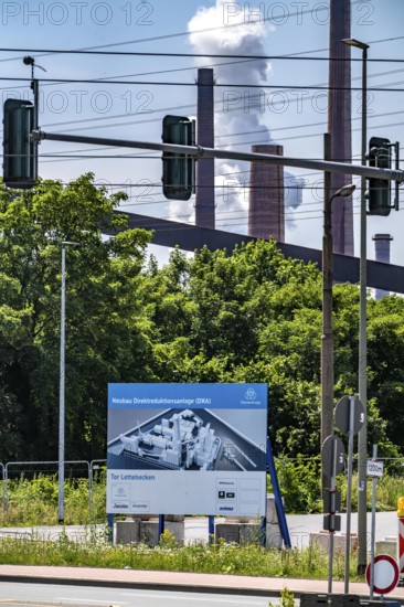 Construction site sign for thyssenkrupp Steel's first direct reduction plant, the climate-neutral