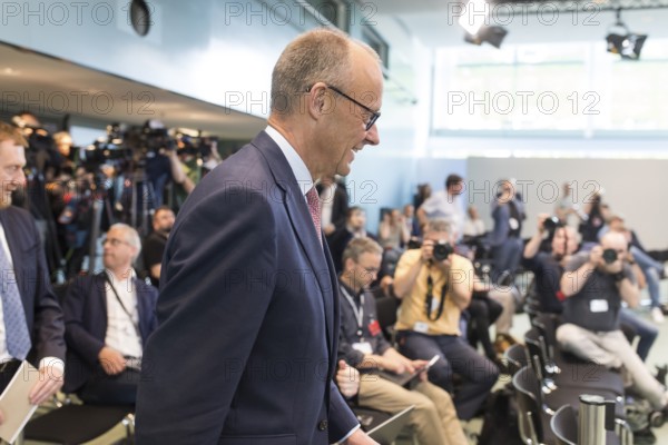 Friedrich Merz (CDU, Federal Chancellor) on his way to the press conference after the consultation